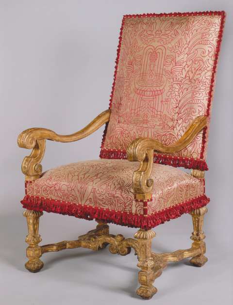 A RARE AND EXCEPTIONAL PAIR OF LOUIS XIV SCULPETED GILTWOOD ARMCHAIRS
